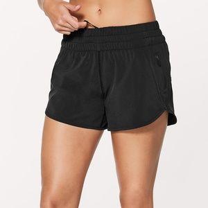 Lululemon Tracker Short V  4" (black, size 4)